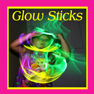 kid playing with glow stiks