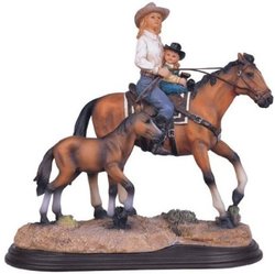 cowgirl on horse figurine